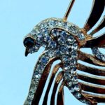 Vintage Bird Pin – Blue Eyes & Feather Gemstones
